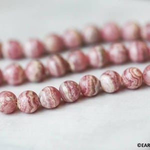 Rhodochrosite 7mm Round beads 15.5" strand