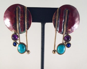 Red copper drop clip earrings with brass accents and turquoise, lapis, and amethyst.