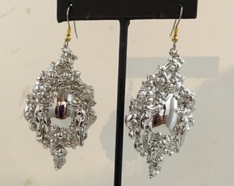 Rhodium plated brass cherub design hook earrings