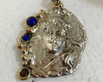 Sterling silver lady pendant with brass accents and lapis and carnelian stones