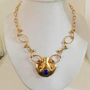 Gold plated brass circle bib necklace with lapis