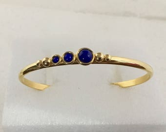 Gold plated brass cuff bracelet with lapis stones