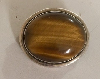 Sterling silver oval pin with oval tiger's eye stone