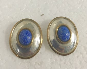 Sterling silver oval stud earrings with brass accents and lapis stones