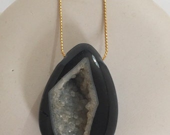 Black onyx druzy pendant with white interior (chain not included)