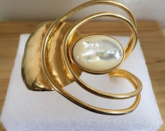 Gold plated brass cuff bracelet with mother of pearl