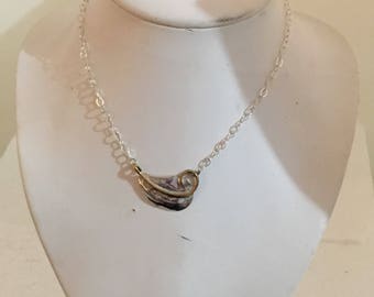 Sterling silver single leaf necklace with brass accents and sterling silver chain