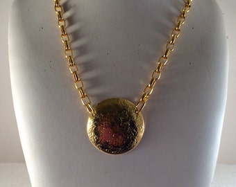 Gold plated brass circle pendant with gold plated brass chain.