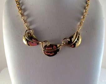 Gold plated brass three leaf necklace with gold plated brass chain.