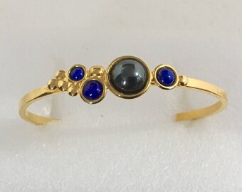 Gold plated brass cuff bracelet with hematite and lapis stones