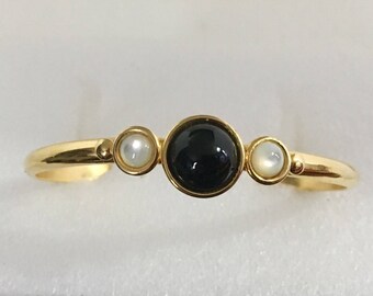 Gold plated brass cuff bracelet with black onyx and mother of pearl stones