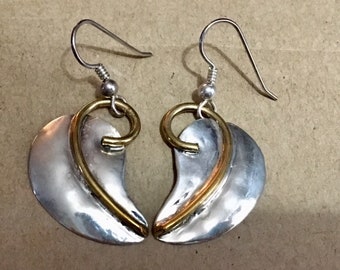Sterling silver leaf hook earrings with brass accents.