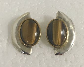Sterling silver half circle stud earrings with brass accents and tiger's eye stones