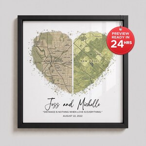 May include: A framed wall art piece featuring two map halves shaped like a heart, one labeled Sacramento and the other New Jersey. Below the maps, the text reads Jess and Michelle, "DISTANCE IS NOTHING WHEN LOVE IS EVERYTHING." and AUGUST 22, 2022.