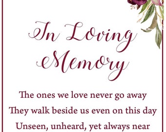 May include: A white card with burgundy floral accents and the text "In Loving Memory" at the top. The card features a poem about remembering loved ones who have passed away.