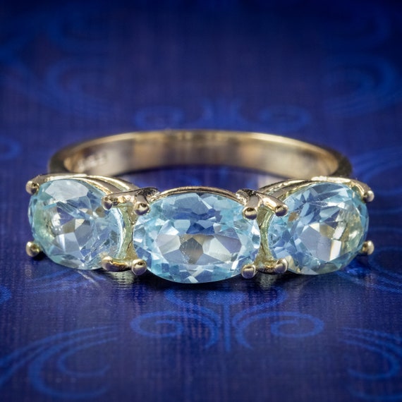 Blue Topaz Trilogy Ring 9ct Gold 3ct Of Topaz