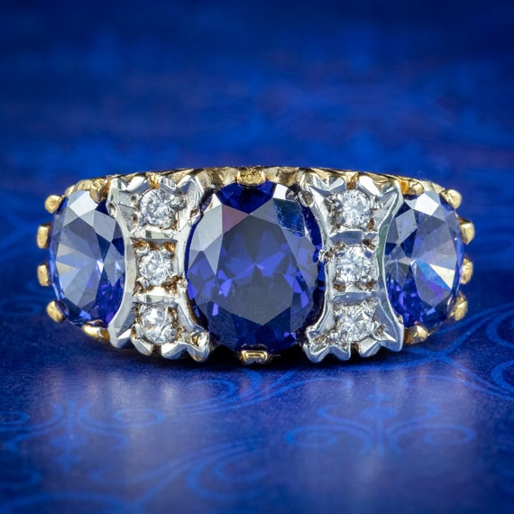 Victorian Style Carved Half Hoop Cz Tanzanite Trilogy Ring