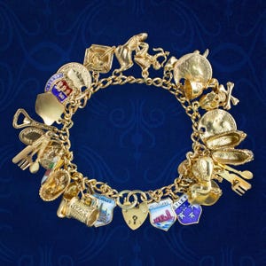 Vintage Charm Bracelet Silver 18ct Gold Gilt 27 Charms