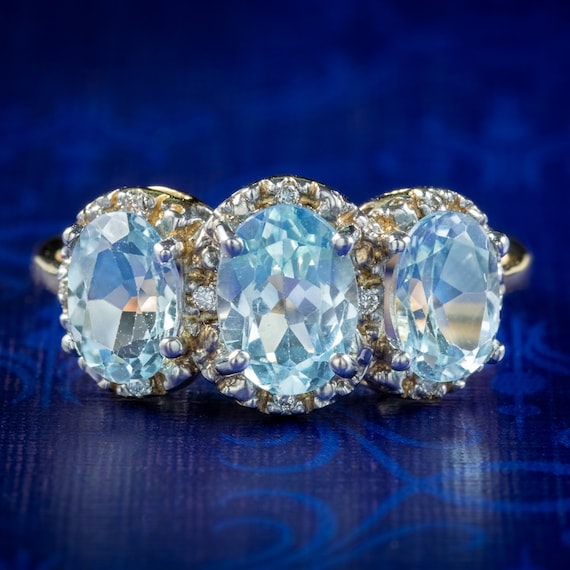 Blue Topaz Diamond Trilogy Gold Ring