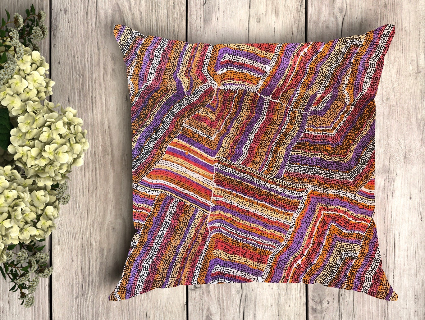 Multi-coloured mini cushions with Australian Aboriginal art prints