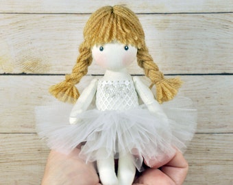 Little miniature ballerina doll in a pack , fairy