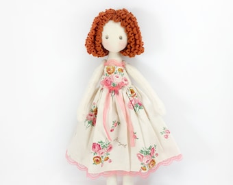 Rag doll with red hair in a removable dress