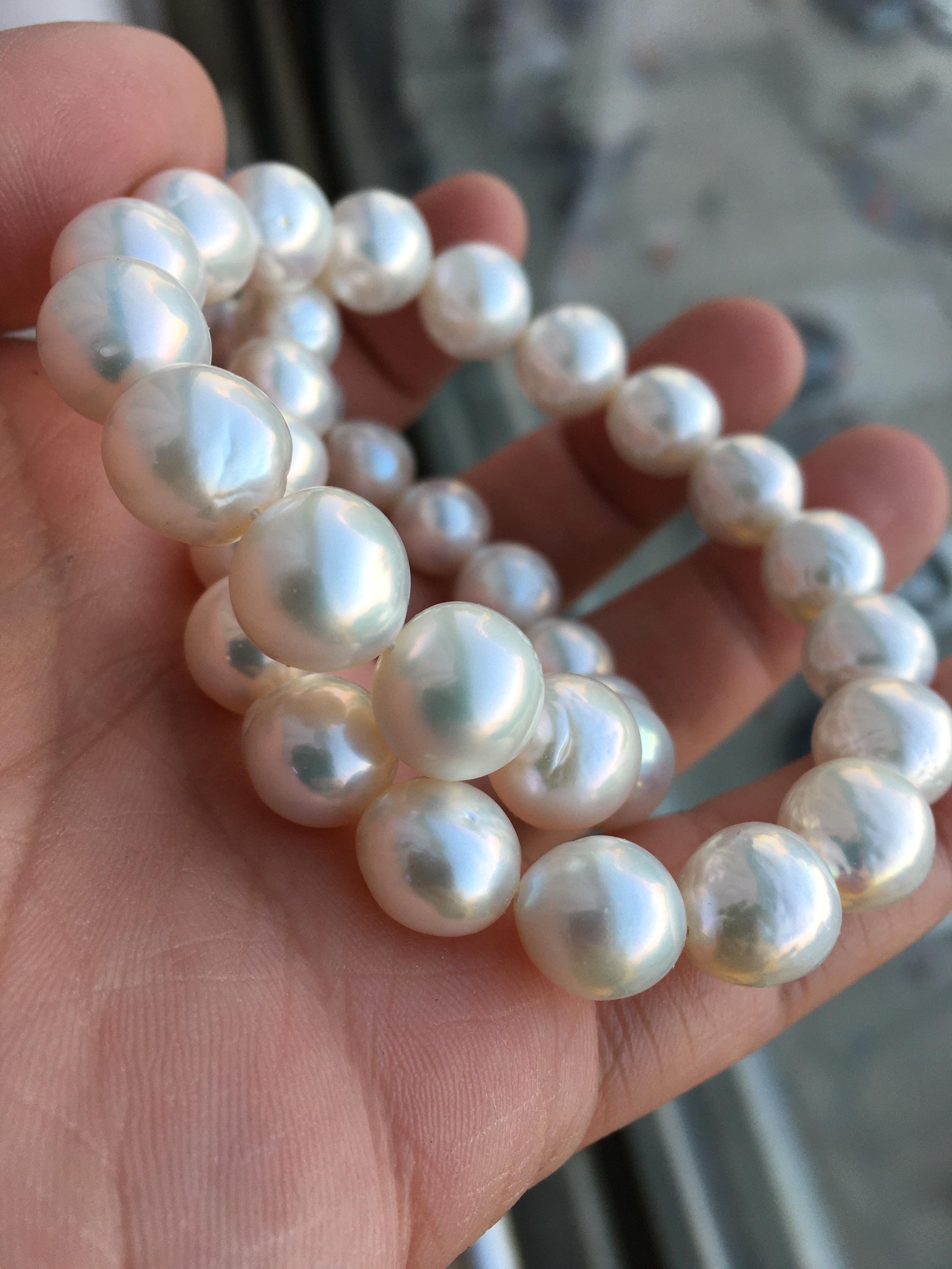thumbnail interactive-video image 1 of Natural South Sea Baroque White Pearl Necklace – 10-11mm Beads, 18 Inches 1 of 4
