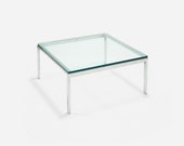Chrome and glass table designed by Florence Knoll