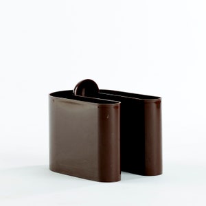Brown plastic magazine holder designed by Rodolfo Bonetto image 1