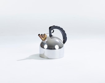 Vintage Post Modern design stainless steel, plastic, and copper tea kettle designed by Richard Sapper for Alessi