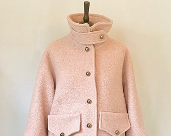 Vecchia giacca di lana cotta rosa