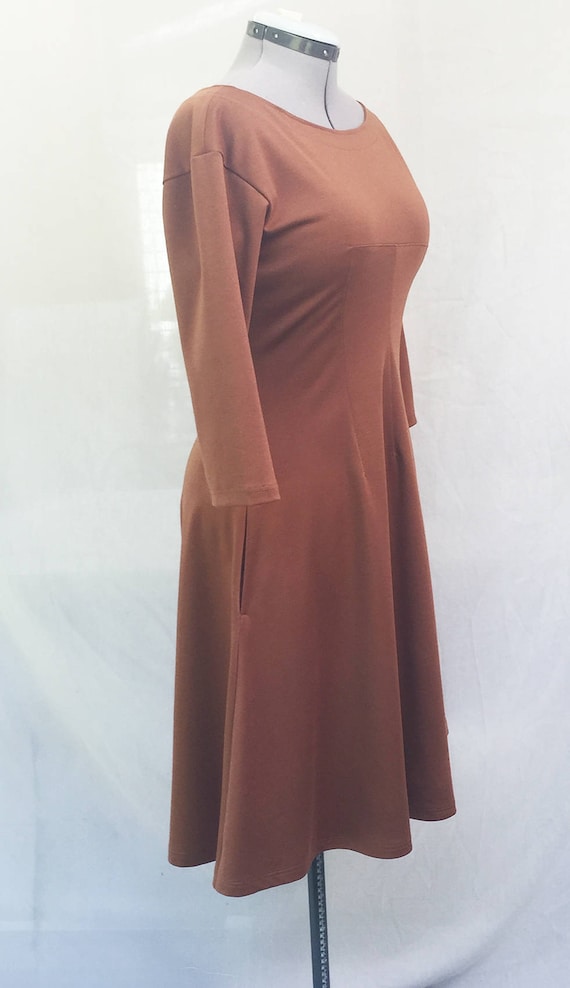 camel skater dress Missguided Petite cord skater dress with puff sleeves in camel