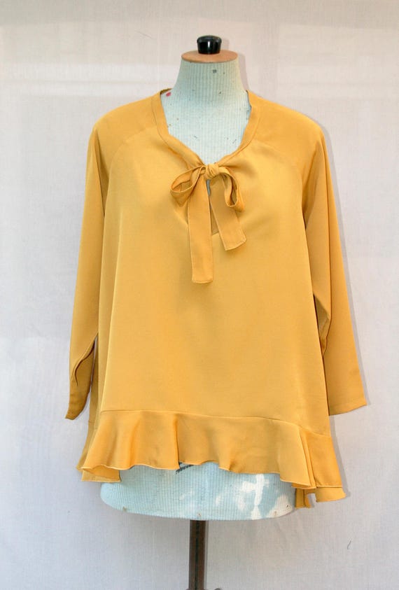 mustard yellow blouse