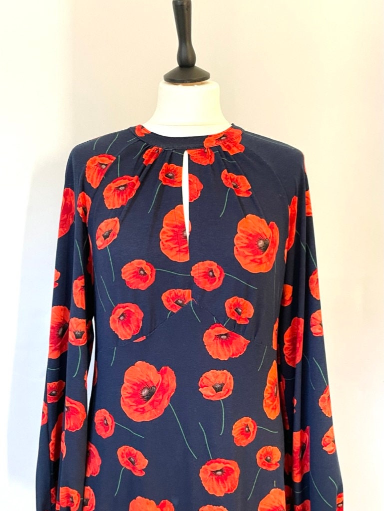 Navy blue and red floral dress.
