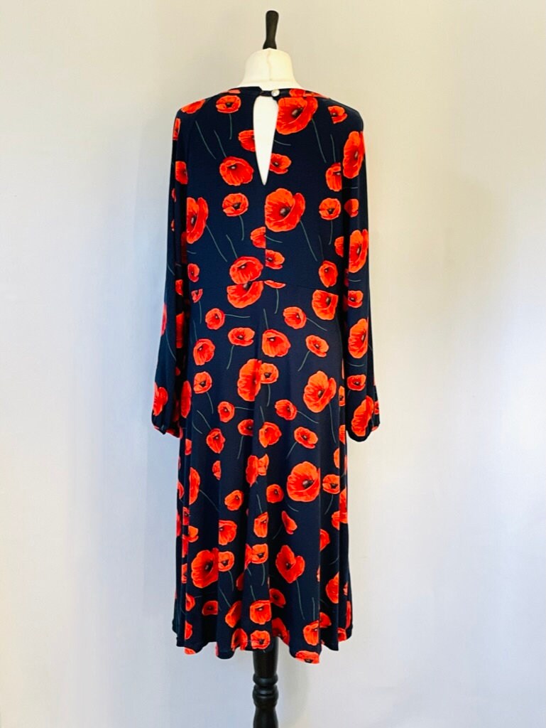open lace back dress Navy and Red Floral Crochet Lace Yoke Dress · Filly Flair main image 0