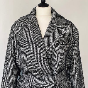 Chaqueta tweed negra y gris
