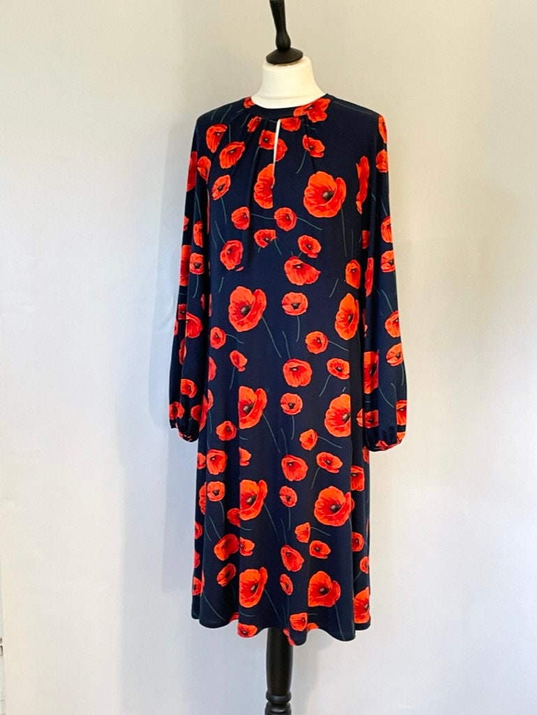 Navy blue and red floral dress. Navy blue and red floral dress.