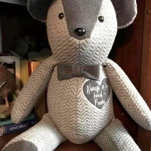 Memory bear made from your shirt. bow tie and heart phrase, &quot;Always in your heart&quot;.  Bear to hold for comfort.