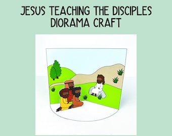 May include: A printable diorama craft depicting Jesus teaching his disciples. The scene shows Jesus sitting on a rock, with two disciples kneeling in front of him. The background features a green grassy hill and a blue sky.