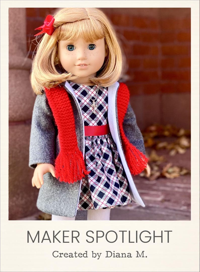 May include: A doll with blonde hair, a red hair bow, and blue eyes. The doll wears a grey coat, a red knit scarf, and a black, white, and red plaid dress with a red waistband. A silver necklace is visible. Text reads: MAKER SPOTLIGHT Created by Diana M.