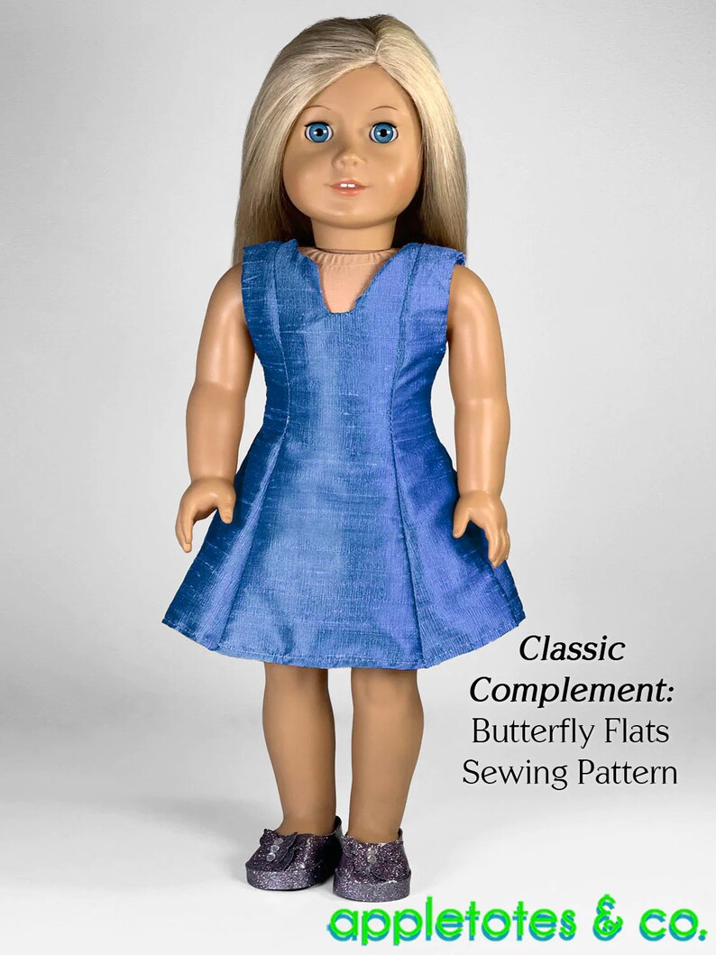 May include: A blue sleeveless dress with a V-neckline on a doll with blonde hair. The doll is wearing sparkly silver shoes. The text "Classic Complement: Butterfly Flats Sewing Pattern" is below the doll. The text "appletotes & co." is at the bottom of the image.
