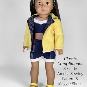 May include: A doll wearing a yellow jacket with white polka dots, a blue and white striped top, blue denim shorts with white trim, and yellow sandals. The doll is wearing white sunglasses and has brown hair. The text "Classic Compliments: Seaside Amelia Sewing Pattern & Maggie Shoes Pattern appletotes & co." is below the doll.