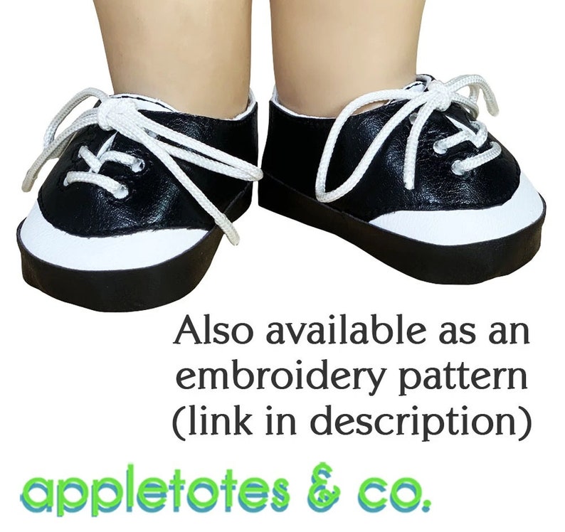 May include: A pair of black and white sneakers with white laces. The shoes have a white trim around the top and a black sole. Also available as an embroidery pattern (link in description) appletotes & co.