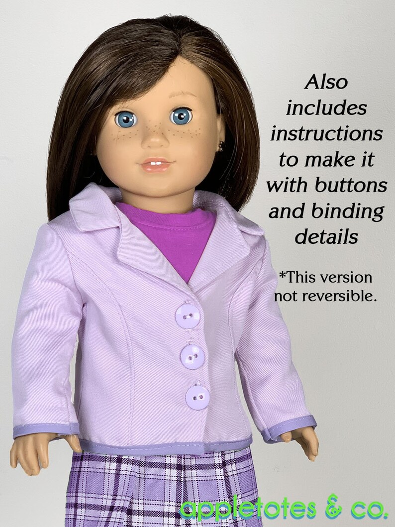 May include: A lavender blazer with a purple plaid skirt and three white buttons. The blazer has a white trim around the collar and cuffs. The doll is wearing a purple shirt underneath the blazer. The text "Also includes instructions to make it with buttons and binding details *This version not reversible." is visible in the image.