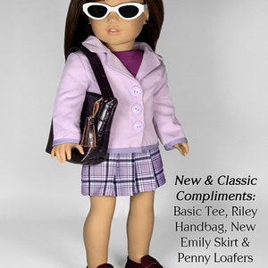 May include: A doll wearing a lavender blazer, a plaid skirt, and burgundy loafers. The doll is holding a brown handbag with a tassel. The text "New & Classic Compliments: Basic Tee, Riley Handbag, New Emily Skirt & Penny Loafers Sewing Patterns appletotes & co." is printed below the doll.