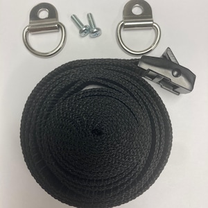 May include: A black strap with a black plastic buckle and two silver D-rings with screws.