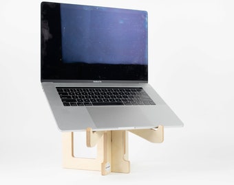 Laptop Stand:  ergonomic,  birch plywood, for MacBooks, portable, parts slide together, great for sit stand desks or table tops.