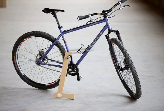 Support de vélo : béquille/support de vélo amovible astucieux,  contreplaqué, pour pédales automatiques, pour garage ou départ de piste. -   France