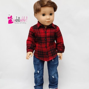 May include: A doll wearing a red and black plaid shirt, blue jeans with distressed details, and black and red sneakers.