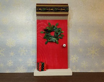 Red Elf Door with Wreath and Christmas Present